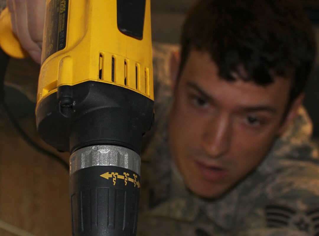 soldier using a drill